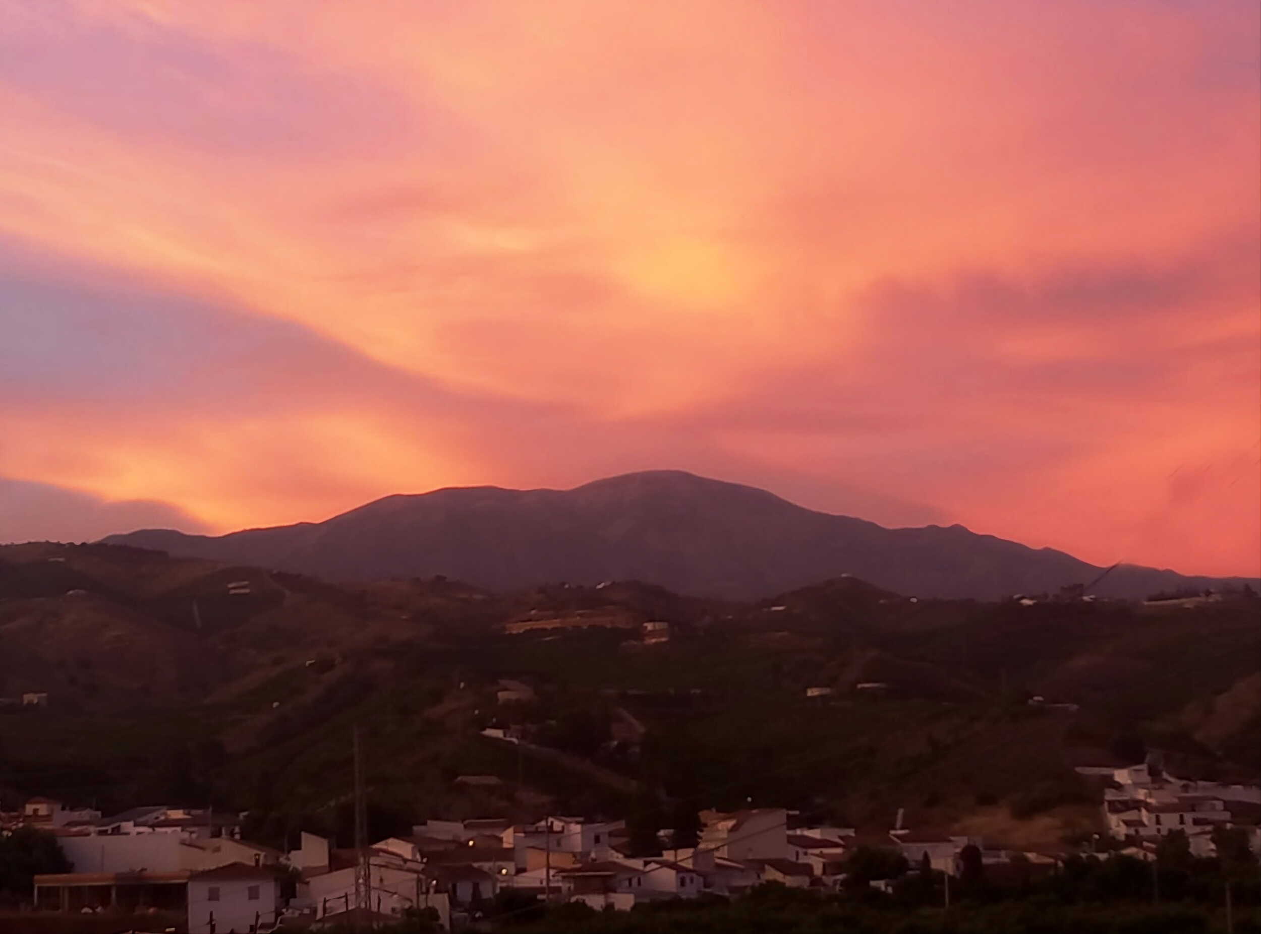 Sunset view across the Malaga mountains and village